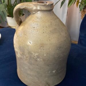 Old vintage whiskey looking jug really good looking even with all the marks.